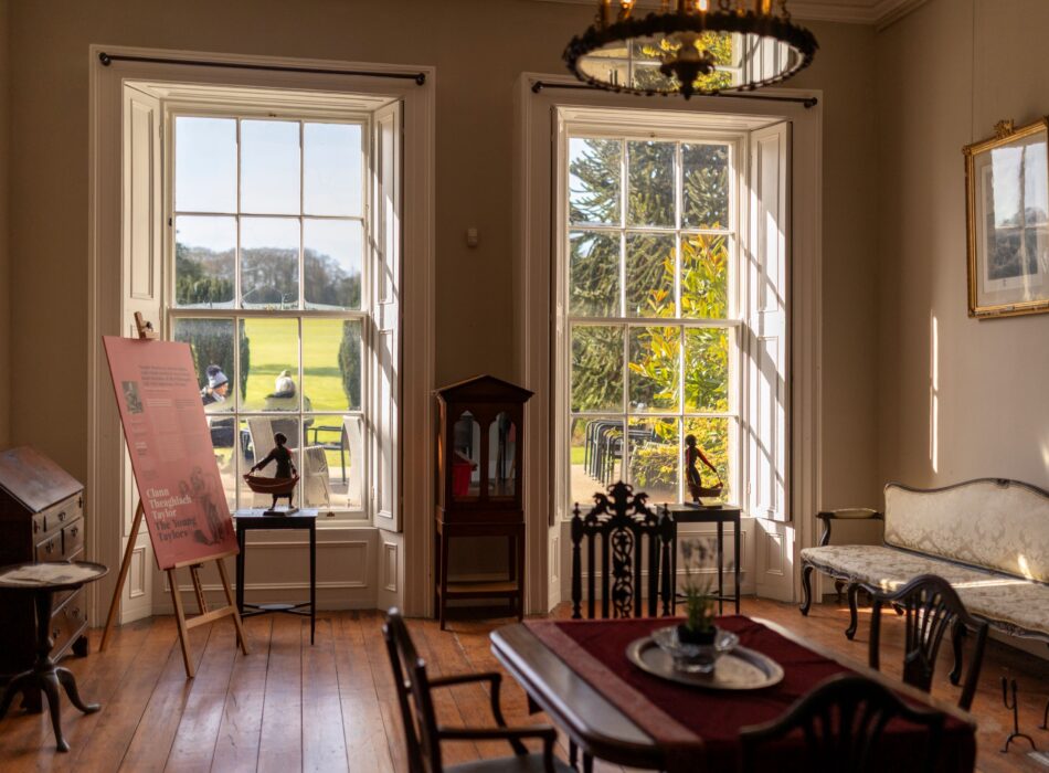 Historic drawing room interior at Ardgillan Castle with period furniture and garden views