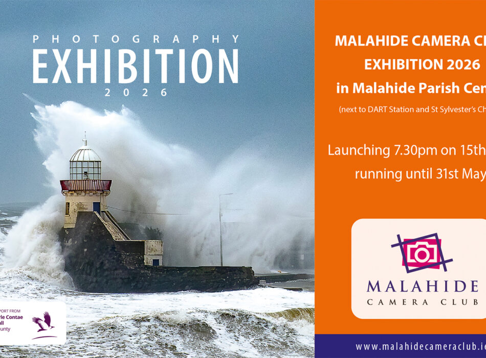 Poster for the Malahide Camera Club Photography Exhibition 2026 featuring a dramatic photograph of waves crashing around a lighthouse, with exhibition details and club logo on an orange background.