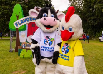 Flavour of Fingal a cow and a chicken dressed in a Flavours of Fingal branded t shirt.