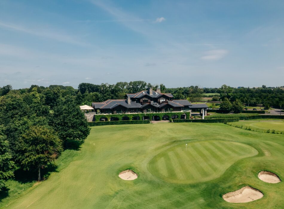 Ariel view of Luttrellstown Golf Club clubhouse set agaisnt green fairways.
